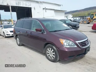 2008 Honda Odyssey EX-L with VIN 5FNRL38748B402957, listed as a IAAI auction lot 42092761 with 142,927 mi miles. Bid and sale history available at carsss.com. Image 1.