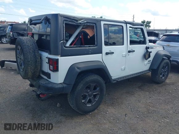 2017 Jeep Wrangler Unlimited Rubicon Recon with VIN 1C4BJWFG1HL693572, listed as a IAAI auction lot 42601855 with 64,342 mi miles and . Bid and sale history available at DreamBid. Image 4.