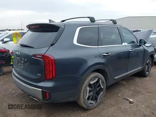 2023 Kia Telluride S with VIN 5XYP6DGC7PG339945, listed as a IAAI auction lot 41903398 with 25,072 mi miles and . Bid and sale history available at DreamBid. Image 4.