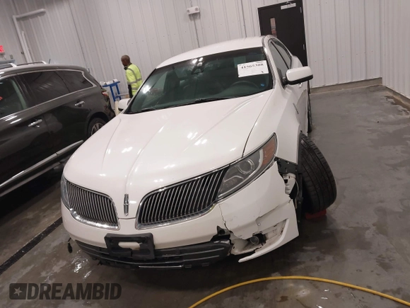 2014 Lincoln MKS with VIN 1LNHL9EK5EG605750, listed as a IAAI auction lot 41565308 with 167,835 mi miles. Bid and sale history available at carsss.com. Image 12.