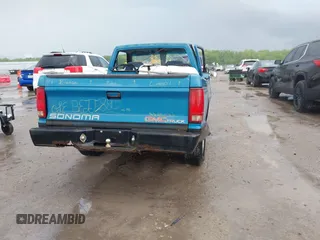 1992 GMC Sonoma z VIN 1GTCS14A9N8529102, wystawiony jako IAAI lot #42268788 z przebiegiem 83 781 mil mil oraz . Historia ofert i sprzedaży dostępna na DreamBid. Obrazek 4.