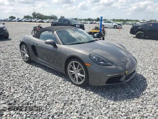 2023 Porsche Boxster with VIN WP0CA2A81PS205206, listed as a Copart auction lot 59809215 with 9,483 mi miles and Salvage title. Bid and sale history available at DreamBid. Image 4.