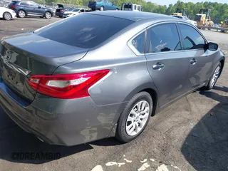 2017 Nissan Altima SV with VIN 1N4AL3AP5HC223921, listed as a IAAI auction lot 42069955 with 166,564 mi miles and . Bid and sale history available at DreamBid. Image 4.
