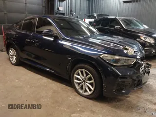 2022 BMW X6 M50i z VIN 5UXCY8C05N9J70601, wystawiony jako IAAI lot #42344397 z przebiegiem 49 085 mil mil oraz . Historia ofert i sprzedaży dostępna na DreamBid. Obrazek 1.