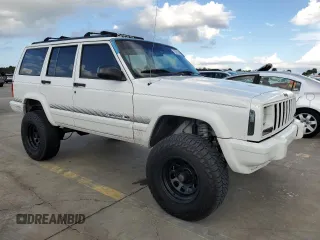 1998 Jeep Cherokee Sport with VIN 1J4FT68S7WL174028, listed as a Copart auction lot 73812524 with 0 mi miles and Salvage Title. Bid and sale history available at carsss.com. Image 4.