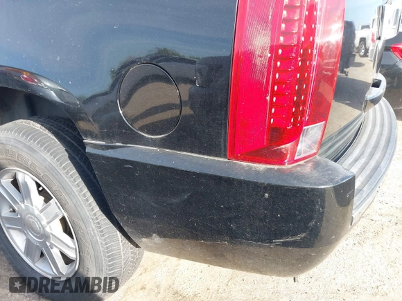 2008 Cadillac Escalade with VIN 1GYEC63868R200366, listed as a IAAI auction lot 41820968 with 190,559 mi miles. Bid and sale history available at carsss.com. Image 13.