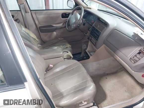 1997 Toyota Avalon XL with VIN 4T1BF12BXVU163858, listed as a IAAI auction lot 41486234 with 228,917 mi miles and . Bid and sale history available at DreamBid. Image 5.