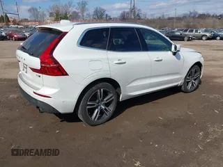 2019 Volvo XC60 Momentum with VIN LYV102RK9KB206928, listed as a IAAI auction lot 41673598 with 25,512 mi miles and . Bid and sale history available at DreamBid. Image 4.