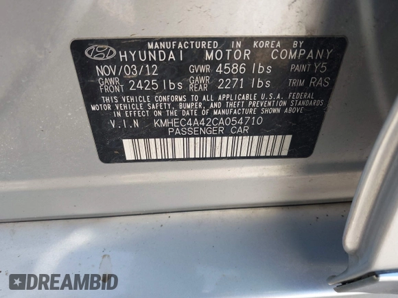 2012 Hyundai Sonata Hybrid z VIN KMHEC4A42CA054710, wystawiony jako IAAI lot #41871775 z przebiegiem Nie podano mil oraz . Historia ofert i sprzedaży dostępna na DreamBid. Obrazek 9.