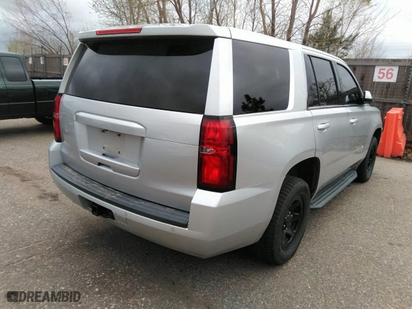 2016 Chevrolet Tahoe Commercial with VIN 1GNSKDEC5GR368328, listed as a IAAI auction lot 41975629 with 104,205 mi miles. Bid and sale history available at carsss.com. Image 4.