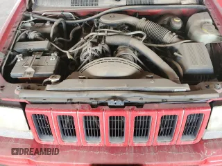 1998 Jeep Grand Cherokee Limited with VIN 1J4GZ78Y0WC294461, listed as a Copart auction lot 69477664 with 209,295 mi miles and Clean Title. Bid and sale history available at carsss.com. Image 12.