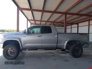 2015 Toyota Tundra Limited with VIN 5TFBW5F14FX424723, listed as a IAAI auction lot 42129929 with 222,060 mi miles and . Bid and sale history available at DreamBid. Image 14.
