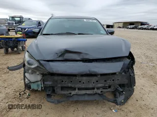 2014 Mazda 3 S Touring with VIN JM1BM1L31E1159880, listed as a Copart auction lot 86651664 with 140,337 mi miles and Salvage Title. Bid and sale history available at DreamBid. Image 5.