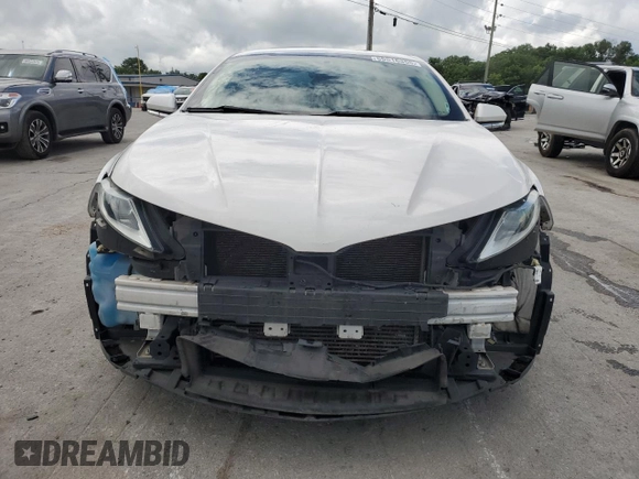 2015 Lincoln MKZ z VIN 3LN6L2J90FR601908, wystawiony jako Copart lot #55516355 z przebiegiem 127 487 mil mil oraz Szkoda całkowita • Salvage title. Historia ofert i sprzedaży dostępna na DreamBid. Obrazek 5.