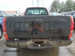 2001 Ford F-150 XL z VIN 3FTZF17291MA72686, wystawiony jako Copart lot #83103904 z przebiegiem 126 018 mil mil oraz Szkoda całkowita • Salvage title. Historia ofert i sprzedaży dostępna na DreamBid. Obrazek 6.