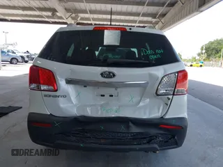 2013 Kia Sorento LX with VIN 5XYKT3A69DG370190, listed as a IAAI auction lot 42456161 with 170,196 mi miles and . Bid and sale history available at DreamBid. Image 16.