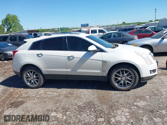 2013 Cadillac SRX Premium Collection with VIN 3GYFNEE33DS554556, listed as a IAAI auction lot 42152972 with 144,668 mi miles and . Bid and sale history available at DreamBid. Image 13.