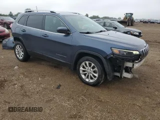2019 Jeep Cherokee Latitude with VIN 1C4PJLCB9KD412004, listed as a Copart auction lot 61642015 with 121,336 mi miles and Salvage title. Bid and sale history available at DreamBid. Image 4.
