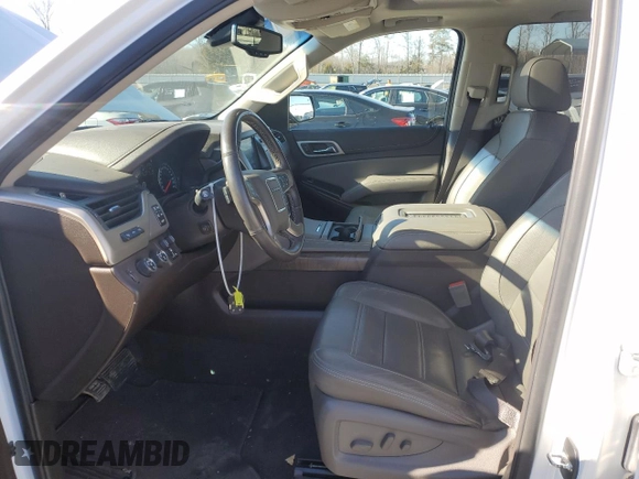 2019 GMC Yukon XL Denali with VIN 1GKS2HKJ2KR103446, listed as a Copart auction lot 88519755 with 77,779 mi miles and Salvage Title. Bid and sale history available at DreamBid. Image 7.
