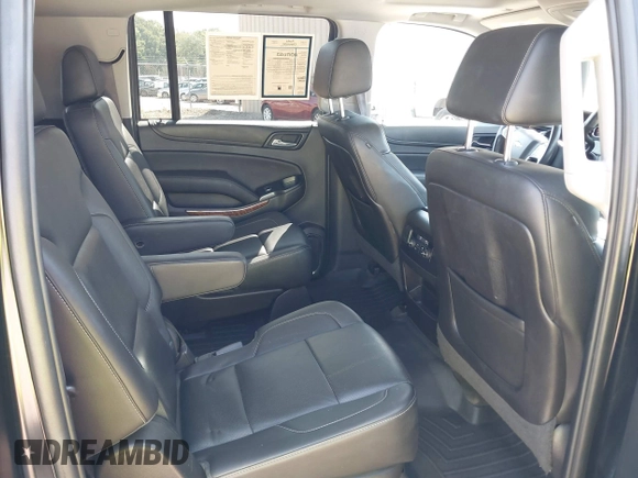 2015 Chevrolet Suburban LTZ with VIN 1GNSKKKC7FR205638, listed as a IAAI auction lot 40284367 with 103,530 mi miles and . Bid and sale history available at DreamBid. Image 8.