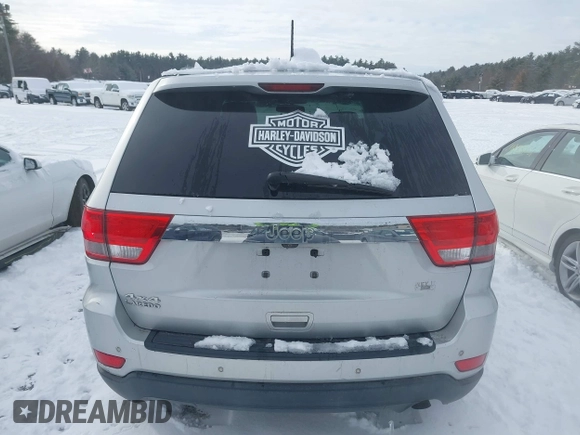 2011 Jeep Grand Cherokee 70th Anniversary with VIN 1J4RR4GGXBC609633, listed as a IAAI auction lot 41469526 with 138,439 mi miles. Bid and sale history available at carsss.com. Image 16.