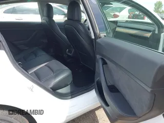 2020 Tesla Model 3 Standard Range Plus z VIN 5YJ3E1EA3LF794276, wystawiony jako IAAI lot #42390409 z przebiegiem 51 924 mil mil oraz . Historia ofert i sprzedaży dostępna na DreamBid. Obrazek 8.