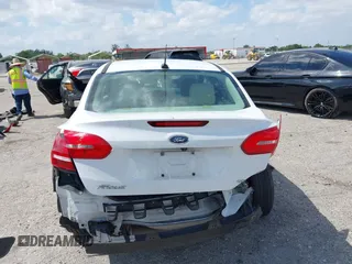 2018 Ford Focus SE with VIN 1FADP3F29JL213008, listed as a IAAI auction lot 41790224 with 85,056 mi miles and . Bid and sale history available at DreamBid. Image 17.