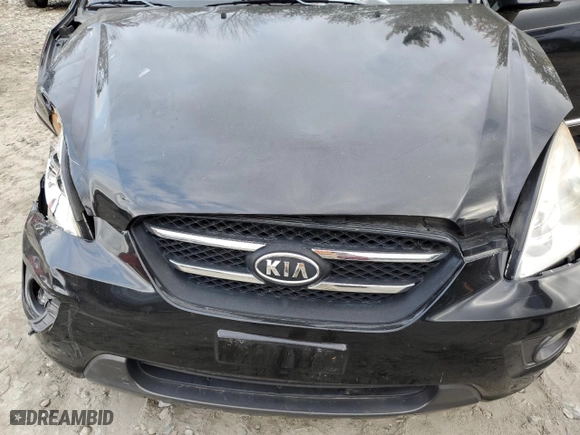 2007 Kia Rondo EX with VIN KNAFG526977118504, listed as a Copart auction lot 74013034 with 95,620 mi miles and Salvage Title. Bid and sale history available at carsss.com. Image 12.