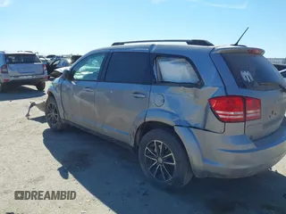 2017 Dodge Journey SE with VIN 3C4PDCAB6HT573617, listed as a IAAI auction lot 41620301 with 158,116 mi miles and . Bid and sale history available at DreamBid. Image 3.
