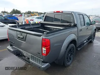 2021 Nissan Frontier SV with VIN 1N6ED0EA6MN722476, listed as a IAAI auction lot 41284313 with 22,476 mi miles and . Bid and sale history available at DreamBid. Image 4.