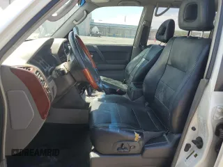 2005 Mitsubishi Montero Limited z VIN JA4MW51S65J000884, wystawiony jako Copart lot #65088034 z przebiegiem Nie podano mil oraz Szkody całkowita. Historia ofert i sprzedaży dostępna na DreamBid. Obrazek 7.