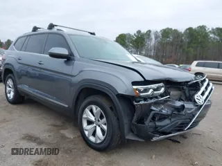 2018 Volkswagen Atlas 3.6L V6 SEL with VIN 1V2MR2CA7JC543769, listed as a IAAI auction lot 41479621 with 122,699 mi miles. Bid and sale history available at carsss.com. Image 1.