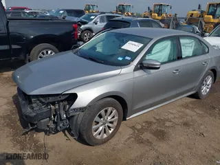 2014 Volkswagen Passat Wolfsburg Ed with VIN 1VWAT7A38EC089882, listed as a IAAI auction lot 41945624 with 130,162 mi miles. Bid and sale history available at carsss.com. Image 2.