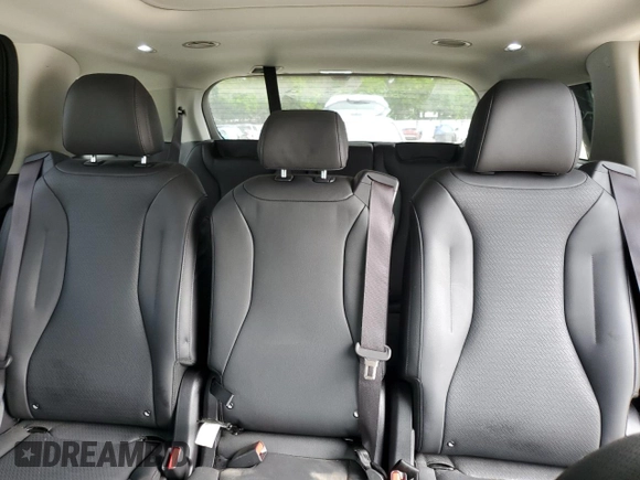 2025 Kia Carnival SX with VIN KNDNE5K37S6490478, listed as a Copart auction lot 51389565 with 6,929 mi miles and Salvage Title. Bid and sale history available at DreamBid. Image 10.