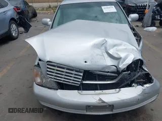 2002 Cadillac DeVille z VIN 1G6KD54Y22U108080, wystawiony jako IAAI lot #42304179 z przebiegiem 278 141 mil mil oraz . Historia ofert i sprzedaży dostępna na DreamBid. Obrazek 12.