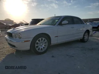 2004 Jaguar XJ with VIN SAJWA71CX4SG21334, listed as a Copart auction lot 70946034 with 0 mi miles and Clean Title. Bid and sale history available at carsss.com. Image 1.