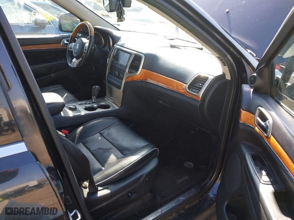 2011 Jeep Grand Cherokee Overland with VIN 1J4RR6GT2BC580377, listed as a IAAI auction lot 42001286 with 179,359 mi miles. Bid and sale history available at carsss.com. Image 5.