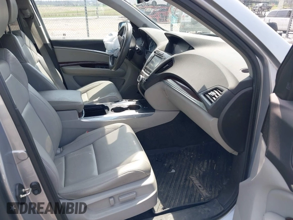 2016 Acura MDX w/Tech with VIN 5FRYD4H47GB039491, listed as a IAAI auction lot 42025711 with 124,491 mi miles. Bid and sale history available at carsss.com. Image 5.