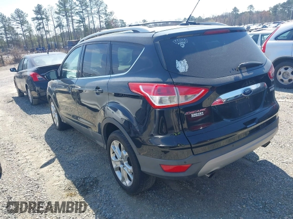 2016 Ford Escape Titanium with VIN 1FMCU0JX8GUC06601, listed as a IAAI auction lot 41785774 with 121,427 mi miles. Bid and sale history available at carsss.com. Image 3.