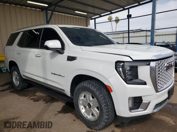 2023 GMC Yukon Denali with VIN 1GKS1DKL1PR239104, listed as a Copart auction lot 47228325 with 64,922 mi miles and Clean Title. Bid and sale history available at carsss.com. Image 4.