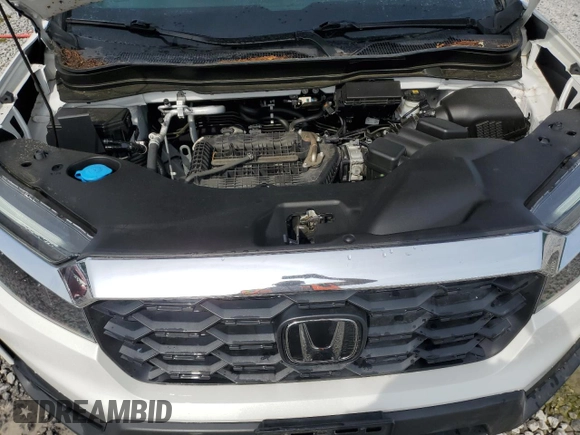 2023 Honda Passport EX-L with VIN 5FNYF8H58PB024039, listed as a Copart auction lot 57269725 with 44,705 mi miles and Salvage title. Bid and sale history available at DreamBid. Image 12.