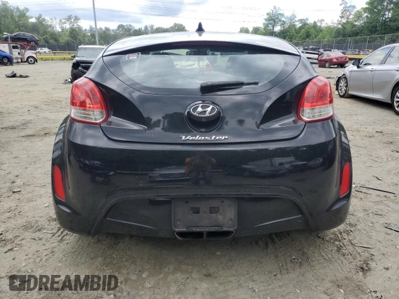 2013 Hyundai Veloster w/Gray Int z VIN KMHTC6AD2DU106887, wystawiony jako Copart lot #58149635 z przebiegiem 159 914 mil mil oraz Szkoda całkowita • Salvage title. Historia ofert i sprzedaży dostępna na DreamBid. Obrazek 6.