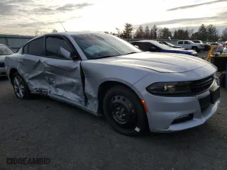 2022 Dodge Charger SXT with VIN 2C3CDXJG1NH162393, listed as a Copart auction lot 84976544 with 5,312 mi miles and Salvage Title. Bid and sale history available at carsss.com. Image 4.