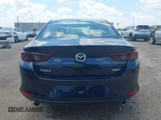 2021 Mazda 3 S z VIN JM1BPAAL6M1331460, wystawiony jako IAAI lot #42197743 z przebiegiem 53 972 mil mil oraz . Historia ofert i sprzedaży dostępna na DreamBid. Obrazek 16.