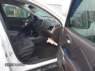 2017 Jeep Cherokee Trailhawk L Plus with VIN 1C4PJMBS2HD225011, listed as a IAAI auction lot 40802716 with 73,714 mi miles. Bid and sale history available at carsss.com. Image 5.
