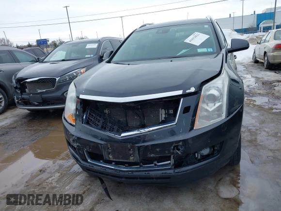 2013 Cadillac SRX Performance Collection with VIN 3GYFNHE33DS527519, listed as a IAAI auction lot 41652822 with 201,580 mi miles. Bid and sale history available at carsss.com. Image 12.
