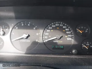 2004 Jeep Grand Cherokee Laredo with VIN 1J4GX48S14C324581, listed as a IAAI auction lot 41717938 with 213,178 mi miles. Bid and sale history available at carsss.com. Image 7.