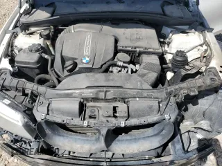 2012 BMW 1 Series 135i with VIN WBAUC9C52CVM12915, listed as a Copart auction lot 67145834 with 114,306 mi miles and Salvage title. Bid and sale history available at DreamBid. Image 11.