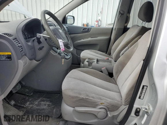 2012 Kia Sedona LX with VIN KNDMG4C79C6496785, listed as a Copart auction lot 73310344 with 130,243 mi miles and Salvage Title. Bid and sale history available at carsss.com. Image 7.