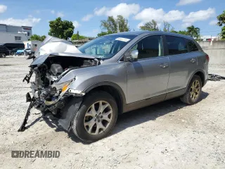 2015 Mazda CX-9 Touring z VIN JM3TB2CA6F0453398, wystawiony jako Copart lot #55897115 z przebiegiem 167 563 mil mil oraz Szkoda całkowita • Salvage title. Historia ofert i sprzedaży dostępna na DreamBid. Obrazek 1.